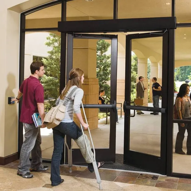 Automatic door featuring an ADA compliant door opener for handicap accessibility.