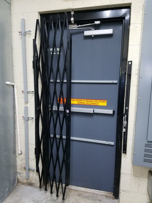 New steel security garage door installed at Massachusetts residential property