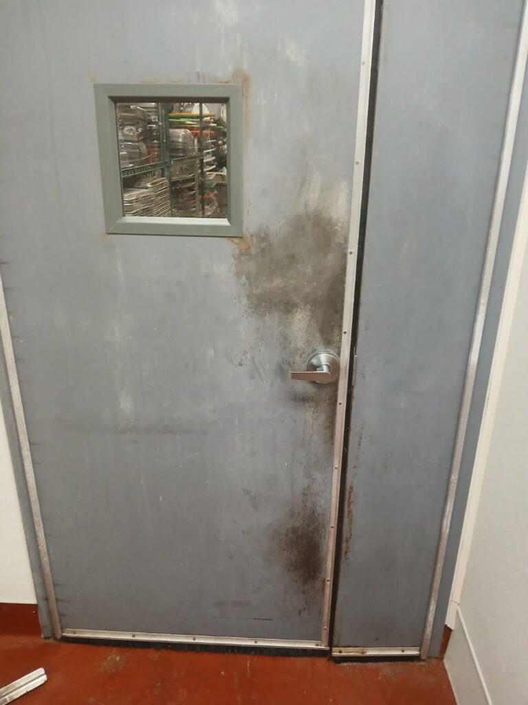 Metal door repair completed by Liberty Door Repair for a client in Atlanta.